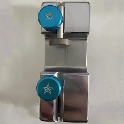 Top view of Dual Clamp Gemstone Bonding Converter And Working Aligning Locator Jig with blue knobs on chrome plated steel.