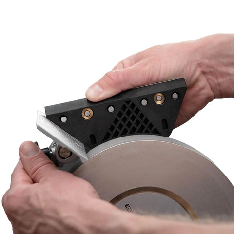 Hands holding Pro-Grade Scissors Sharpening Jig With 60 Degree Angle For Fast, Precise Sharpening On Your Sharpening System