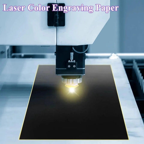 Laser machine working on Four Pcs Black Laser Engraving Paper 39x27 Cm for ceramics glass metal in close-up view.