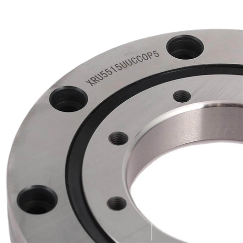 Close-up of a heavy duty small slewing bearing for precision machinery and robotics, featuring a durable cross roller design.