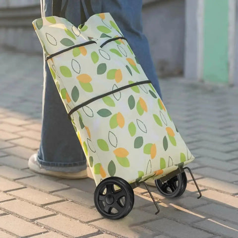 Person pulling a colorful shopping cart with 2 pack heavy duty shopping cart wheels replacement for trolley carts.