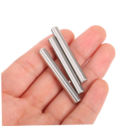 Hand holding 100 Piece Stainless Steel Positioning Pins Set For Quick Precise Component Alignment In Machinery And Electronics Plug And Play Ready Solid Rod Fasteners With Burr Free Smooth Finish For Reliable Fixtures And Easy Setups