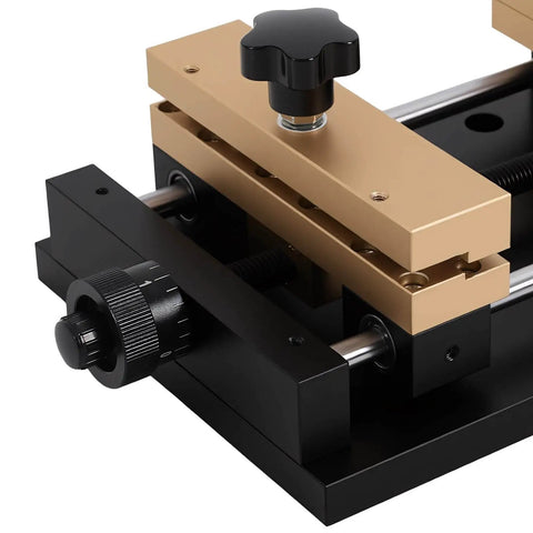 Close-up of adjustable aluminum alloy fixture for laser cutting and marking on metal sheets, 4.72 by 4.72 inch clamping range.