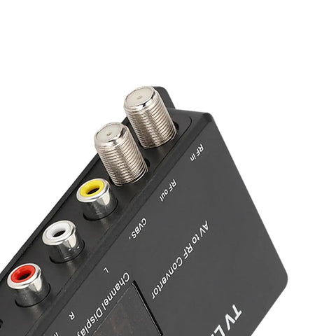 Close-up view of RF Modulator For UHF TV With Infrared Extender, featuring AV to RF connectors and channel display, easy plug and play setup.