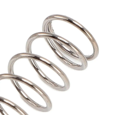Close-up of a 304 stainless steel spring from Three Stainless Steel Pressure Springs For Classic Espresso Machines 9 Bar 8 Bar Six Point Five Bar Replacement Kit Lower Pressure Faster Brew Time Easy Install Durable 304 Stainless Includes Three High Quality Springs.