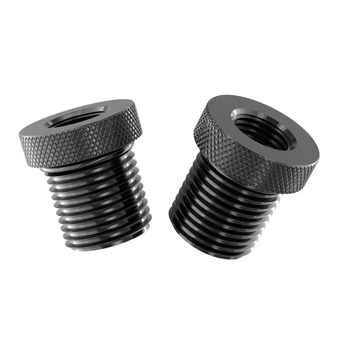 Iron thread adapters with knurled edges, size 1/2x28 to 3/4x16, for automotive use. Focus: Thread Adapters With Rubber Washers For Automotive One Half To Three Quarter Inch.