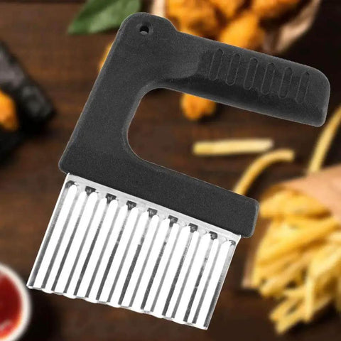 Crinkle Cutter For Veggies With Wave Blade, Stainless Steel French Fry Slicer With Handy Grip Handle, shown on table with fries.