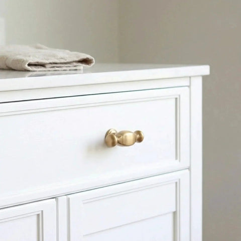 Installed 10 Pack Champagne Bronze Bar Cabinet Knobs Zinc Alloy Furniture Drawer Pulls on white kitchen cabinet drawer.