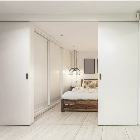 Five Foot Bypass Sliding Door Hardware Kit For Closets Aluminum Alloy Rail System Two Door Set installed in a bedroom