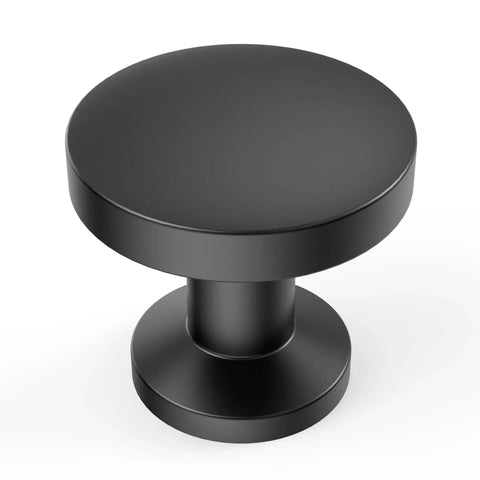 Top view of a single matte black cabinet knob from the 10 Pack 1-1/5 Inch (30mm) Cabinet Knobs Matte Black For Cabinets, Dresser, And Kitchen Drawers.