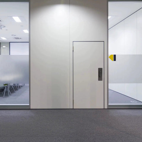Modern office with sliding doors featuring 304 Stainless Steel Push Pull Door Handle With Screws For Fireproof Passages