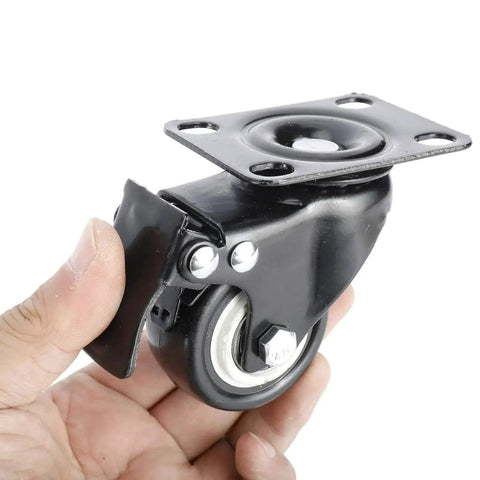 8 Pack 2 Inch Heavy Duty Swivel Plate Caster Wheels With Double Brake And PU Foam No Noise For Furniture Tables Trolleys Workbenches And Garage Use Each Caster Supports Up To 150 Lbs Durable Top Plate With Double Ball Bearing For Smooth Quiet Rolling, close-up view in hand