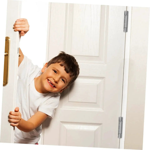 Child holding door fitted with Heavy Duty Double Swing Self Closing Door Hinges for Outdoor Gates and Garage Doors Easy Install
