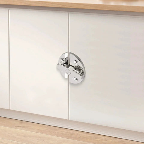 Turn-button boat hatch latch in marine-grade 316 stainless steel, mounted on white cabinet door
