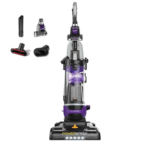 Eureka PowerSpeed upright vacuum in purple with automatic cord rewind; includes crevice tool and brush attachments.
