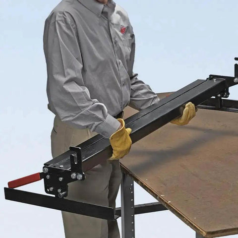 Person using MB48B 48 Inch Pan Style Mini Brake for 22 gauge galvanized steel on workbench, single person setup