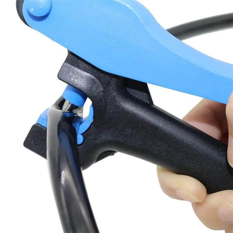 Close-up of 2 In 1 Drip Irrigation Tubing Hole Punch Tool Set in use, showing blue handle and black tubing insertion for DIY garden irrigation.