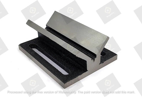 V Block Jig Fixture for center drilling, solid iron, precision machined surfaces, visible in solid unbreakable construction.