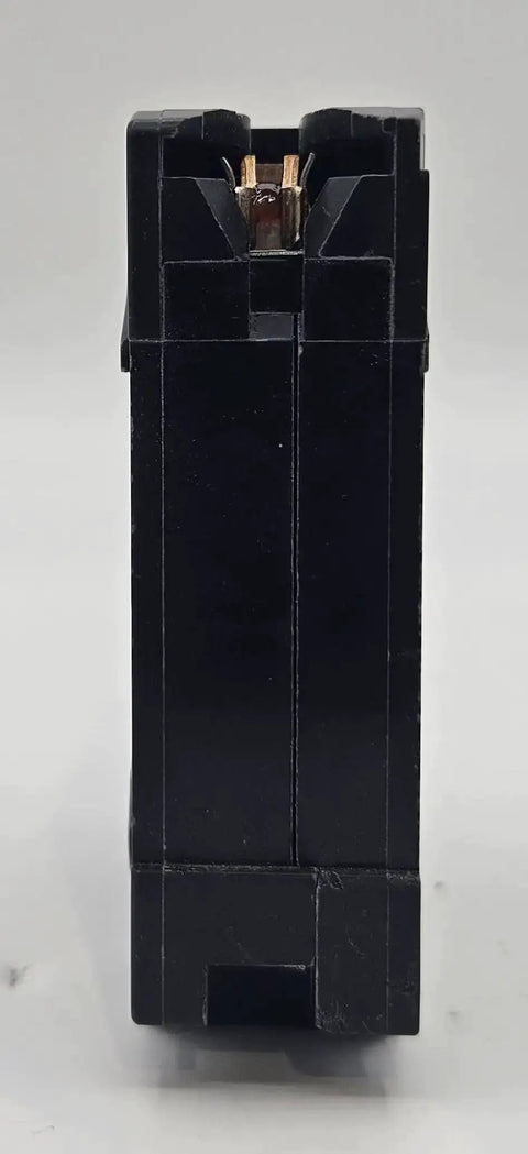 Side view of a black Homeline 20 Amp 120 Volt Plug In Circuit Breaker 1 Pole UL Listed 10 kA AIR Standard Type 10 Pack for panel install.