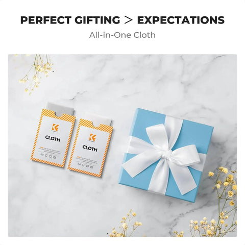 Two Pack Microfiber Lens Cleaning Cloths For Glasses Cameras VR AR Headsets next to blue gift box with white ribbon