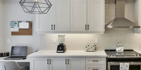 Modern kitchen with white cabinets featuring Matte Black 5 Inch Cabinet Pulls 10 Pack With 128mm Hole Centers Durable Kitchen Cabinet Hardware.