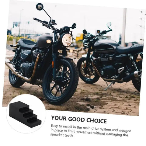 Mobestech locking motorcycle hub nut tool (black wedge) shown with two dark motorcycles in the background
