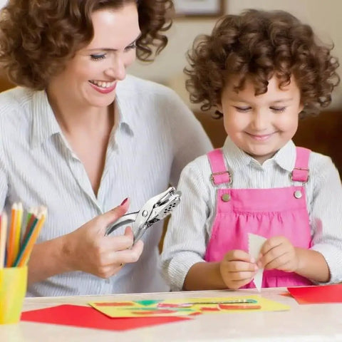 Mother and child using 36 Pack One Quarter Inch Single Hole Punch Kit Made From Metal for crafts and DIY projects at a table.