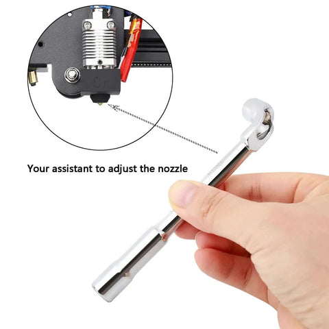 Hand holding a nozzle adjustment tool for 25Pcs MK8 Ender 3 V2 Brass Nozzles 0.4mm Set With DIY Tools Storage Box For Creality Ender 3 Series And CR 10 3D Printers Ready To Rock High Heat Abrasion Resistant
