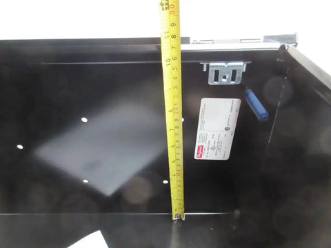 Interior view of black 20x16x10 Industrial Control Panel Enclosure NEMA 4 and 12, showing depth measurement with tape measure inside.