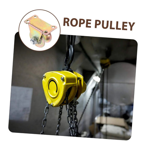 Close-up of yellow industrial rope pulley system in use, focus on chain and hook mechanism for lifting machinery.