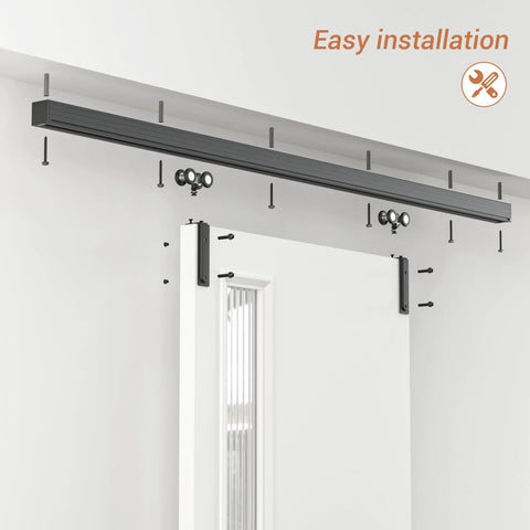 60 Inch Box Rail Sliding Barn Door Hardware Kit With Ceiling Mount Heavy Duty Aluminum Track In Black Powder Coat Outdoor Ready And Anti Corrosion Fits Doors Up To 26 Inch Opening Up To 30 Inch Panel Width 1 Inch Door Thickness, shown installed on a white wall with a door.