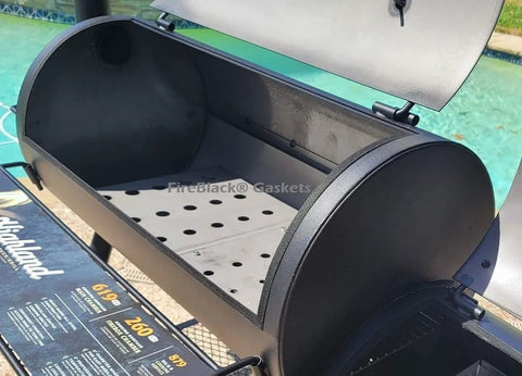 FireBlack Hi Temp BBQ Smoker Gasket, black metal barrel grill with open lid and perforated interior tray