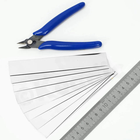 10 Piece Stainless Steel Shim Stock Set With 1 Inch Width And 6 Inch Length, 0.01 Inch Thick, Metal Shim Shims alongside ruler and tool