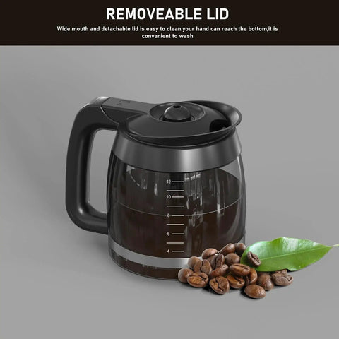 Front view of a black-handled 12-cup glass coffee carafe with removable lid and visible measurement marks.
