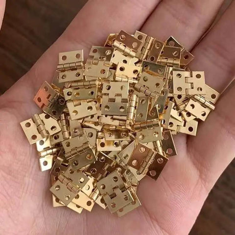 1:12 Scale Miniature Door Hinges With Screws, Set Of 4 For Dollhouse Doors And Cabinets, held in a hand to show scale