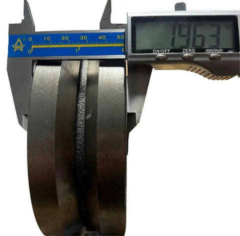 Close-up of 6 Inch Cast Iron V Groove Wheel with caliper measurement, featuring 2 Inch wide profile and weldable heavy-duty steel box