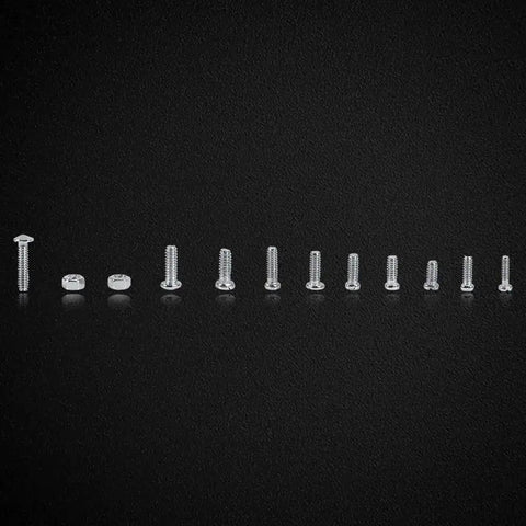 600 Piece Stainless Steel Small Screws And Nuts Assortment Kit With Handy Box Perfect For Watches Glasses Electronics And Quick Home Repairs Includes M1 M1.2 M1.4 M1.6 Sizes For Easy Fixes - screws and nuts variety on black background
