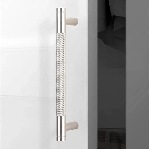 10 Pack 5 Inch Center To Center Brushed Satin Nickel Knurled Cabinet Handles installed on white cabinet door