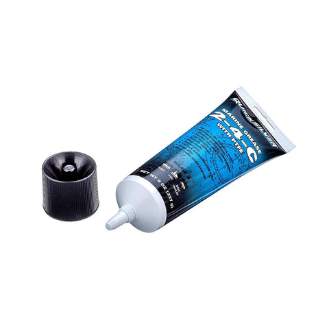 Quicksilver 8 oz marine grease tube with blue label and white nozzle