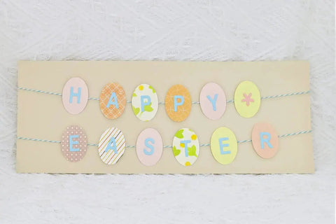 Easter-themed banner with pastel oval cutouts, crafted using Oval Easter Egg 1.5 Inch Lever Action Craft Punch for decoration
