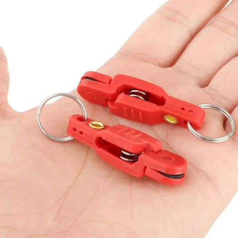 Heavy Tension Downrigger Release Clips For Offshore Fishing Planer Boards Weights And Kites 10 Pack By YUNNLEZT shown in hand