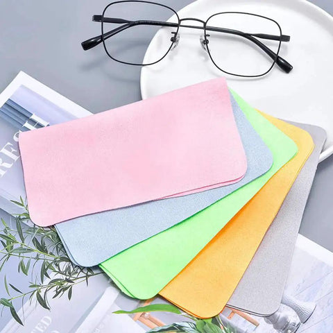 Eyeglass Cleaning Cloths Microfiber 230GSM Thickened Double Sided 10 Pack in assorted colors with glasses on a table