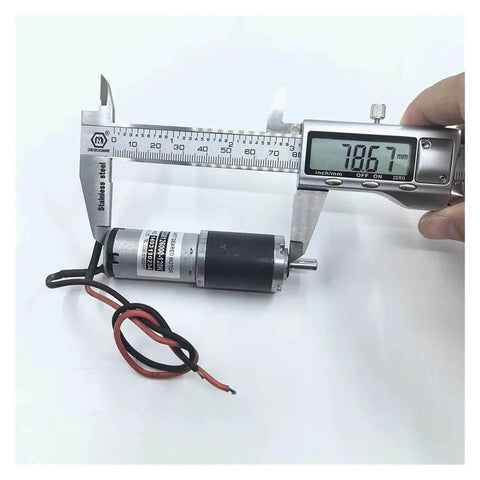 Person measuring Planetary Gearbox Gear Drive Kit with calipers, showing 25mm shaft, DC 6V-12V motor, 24RPM-48RPM output, for RC cars.