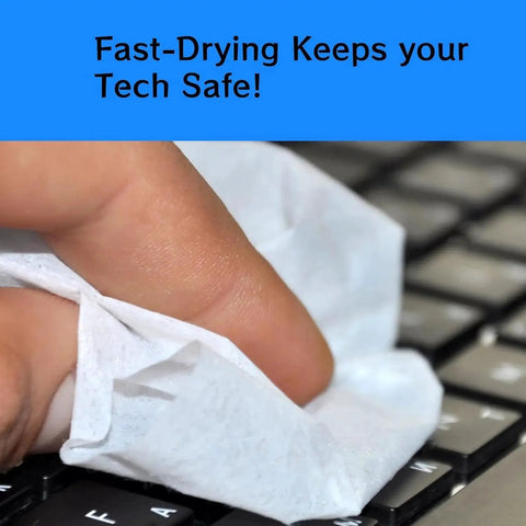 Close-up of a hand using a towelette on a keyboard, illustrating the fast-drying feature of the Hearing Aid Cleaning Towelettes Kit With 160 Wipes And Battery Keychain.