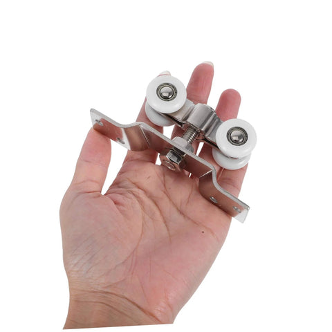2 Pack Sliding Door Rollers Heavy Duty Stainless Steel Silent Nylon Wheels in hand showing size and design