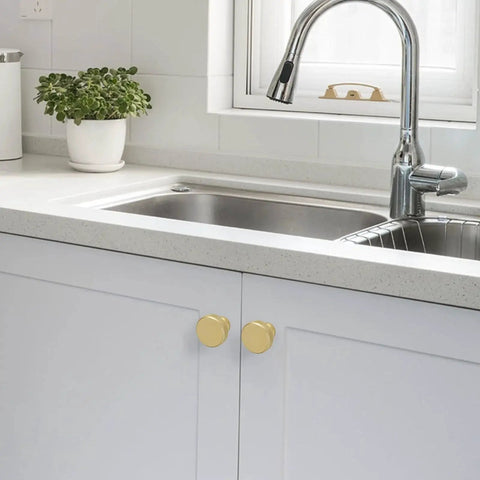 10 Pack Brushed Brass Kitchen Cabinet Knobs With Knurled Texture installed on white kitchen cabinet doors