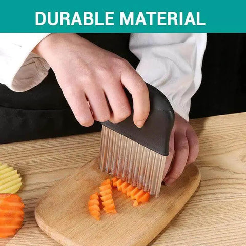 Person using Crinkle Cutter Knife For Waffle Fries And Veggies Large Stainless Steel Potato Cutter With Plastic Handle on carrot slices
