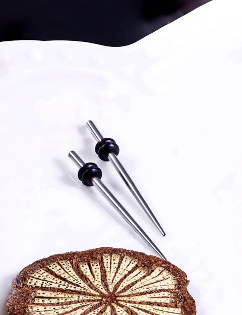 14 Gauge Ear Gauges Stretching Kit Set With 316L Surgical Steel Tapers And Insertion Pins on white background