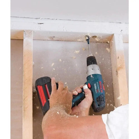 Person using a drill with Daredevil Standard Spade Bit 1 Inch By 6 Inch For Quick Drilling And Clean Holes with Full Cone Threaded Tip