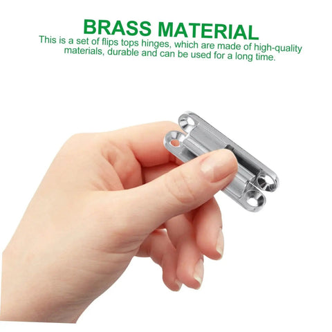 Hand holding a single zinc alloy hinge from the Sturdy Screw-On Metal Door Hinges 4 Pack For Internal Doors, showcasing brass material.